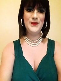 Bare-breasted beauty in blush-colored swimwear