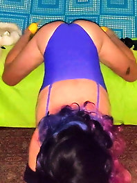 Purple swimsuit and wand album